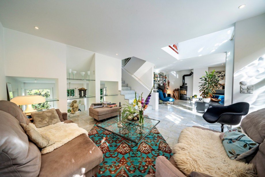 Wohnzimmer-Blick-zu-Kaminzimmer Einfamilienhaus Heidelberg